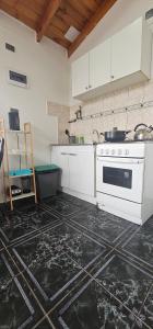 Kuchyň nebo kuchyňský kout v ubytování Cabaña pet friendly el quisco