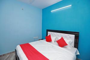 Ένα ή περισσότερα κρεβάτια σε δωμάτιο στο Hotel O Silverline Residency