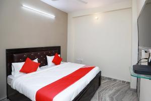 Ένα ή περισσότερα κρεβάτια σε δωμάτιο στο Hotel O Silverline Residency
