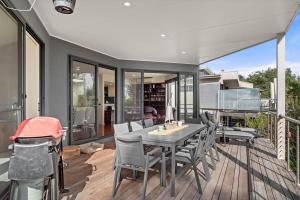 En balkon eller terrasse på Silverdreams Family Retreat on Beach