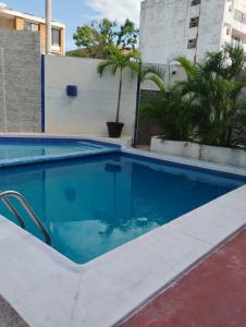 Bazén v ubytování Suites Menavi nebo v jeho okolí