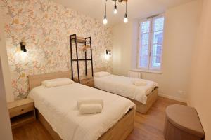 Postel nebo postele na pokoji v ubytování Appartement Georgio