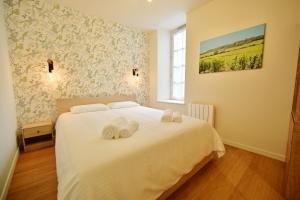 Postel nebo postele na pokoji v ubytování Appartement Georgio