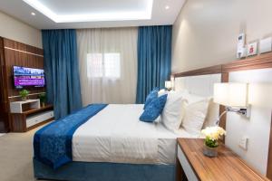 En eller flere senge i et værelse på حياة ريزيدنس ابها + 46 billeder