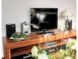 Et tv og/eller underholdning på Bungalow in Strandnaehe, Dornumersiel