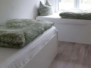 En eller flere senge i et værelse på Pure Nature Parlow