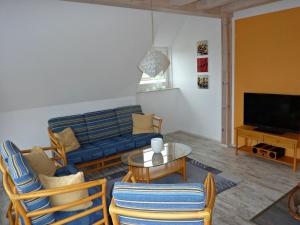 TV a/nebo společenská místnost v ubytování Holiday apartment with 2 bedrooms