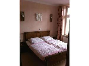 En eller flere senge i et værelse på Holiday apartment with 2 bedrooms + 2 billeder