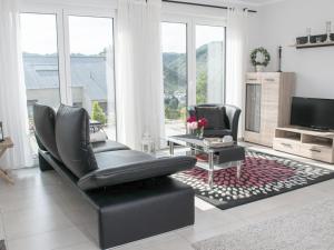 Μια τηλεόραση ή/και κέντρο ψυχαγωγίας στο Moselle Castle View, Koblenz Dieblich