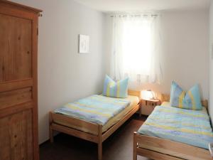 Postel nebo postele na pokoji v ubytování XXL Ferienhaus in Struppen