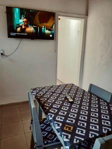 Et tv og/eller underholdning på Alojamiento TORRES