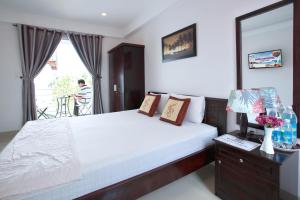 Giường trong phòng chung tại Gia Vien Homestay