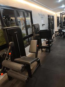 a gym with a row of chairs in a room at The Palace Confort Moema 207 in São Paulo