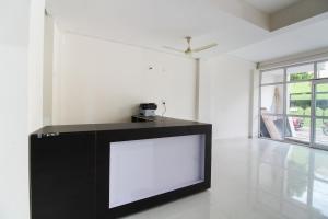 Køkken eller tekøkken på Hotel O Krishna Cottage