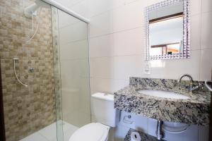 Koupelna v ubytování Bela e Aconchegante + 26 fotografií