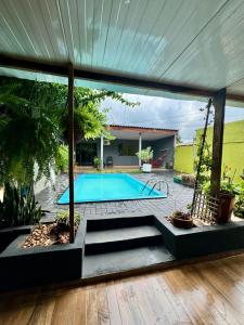 Bazén v ubytování Casa Aconchego da Vó Gera nebo v jeho okolí