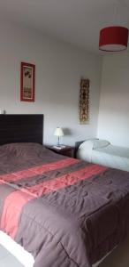 En eller flere senge i et værelse på Samay