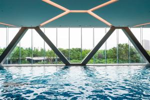 Bazén v ubytování Sheraton Taizhou nebo v jeho okolí