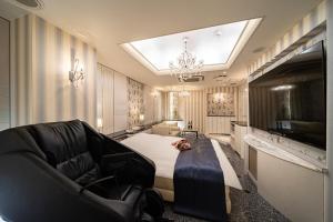 TV a/nebo společenská místnost v ubytování Lucky Sun