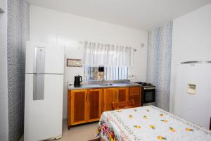 Kuchyň nebo kuchyňský kout v ubytování Bela e Aconchegante