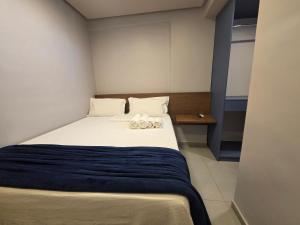 En eller flere senge i et værelse på Duplex at Pajuçara Beach