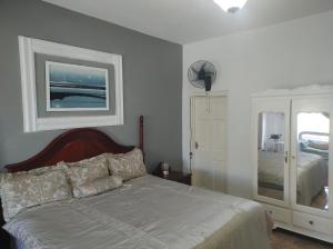 Postel nebo postele na pokoji v ubytování Destiny Palms Apt