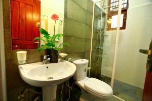 Bilik mandi di Orchidee Apartments