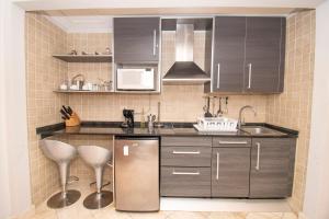 Kuchyň nebo kuchyňský kout v ubytování Propiedad Fishing Lodge