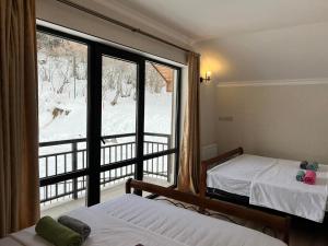 Postel nebo postele na pokoji v ubytování Maison Boutique Villas