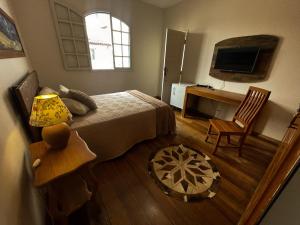 Et tv og/eller underholdning på Allameda Studio Casa de Praia