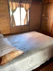 En eller flere senge i et værelse på Chill House kohchang + 14 billeder