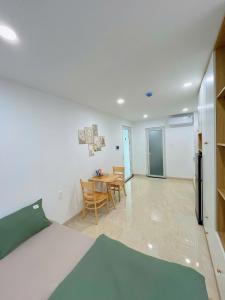 En eller flere senge i et værelse på Hạt Nắng House - Gò Vấp + 10 billeder