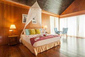 Postel nebo postele na pokoji v ubytování Lankayan Island Dive Resort