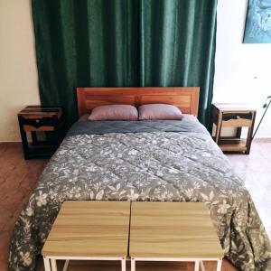 Postel nebo postele na pokoji v ubytování Casa Ix Milagros