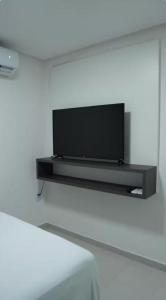 Et tv og/eller underholdning på Villagio Intermares Home Flat