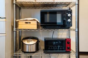 Kuchyň nebo kuchyňský kout v ubytování BASE ogi House of Sakuraoka