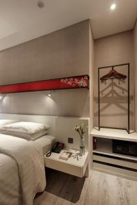 Letto o letti in una camera di City Place Hotel