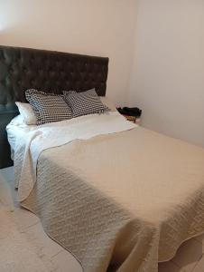 En eller flere senge i et værelse på Depto centrico en San Jose