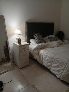 En eller flere senge i et værelse på Depto centrico en San Jose