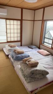 Fotografie z fotogalerie ubytování 温泉館 心が落ち着く別荘地同樺順荘 v destinaci Kusacu