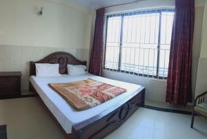 Postel nebo postele na pokoji v ubytování Bilal Guest House Murree