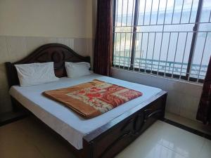 Postel nebo postele na pokoji v ubytování Bilal Guest House Murree