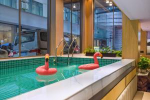 Hồ bơi trong/gần Guilin Meiju Hotel - By West Street in the center