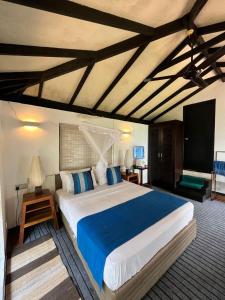 En eller flere senge i et værelse på The Island On Bolgoda