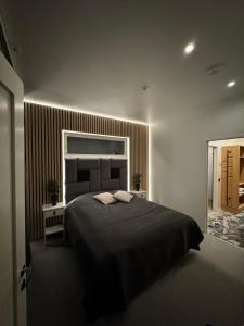 En eller flere senge i et værelse på Luxury for everyday life and leisure - spacious oct