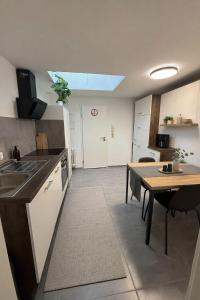 Nhà bếp/bếp nhỏ tại Ferienwohnung H5-1 +3 ảnh