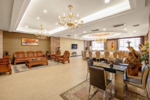 Posezení v ubytování Aksu Pudong Holiday Hotel