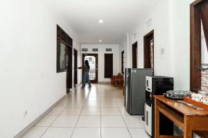 TV a/nebo společenská místnost v ubytování Wisma Eyang Sosro