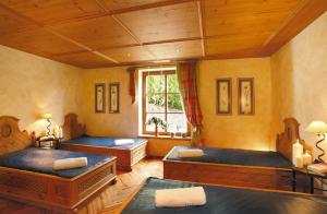 Postel nebo postele na pokoji v ubytování Hotel Klockerhof