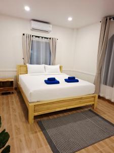 En eller flere senge i et værelse på 373 so cute poolvilla